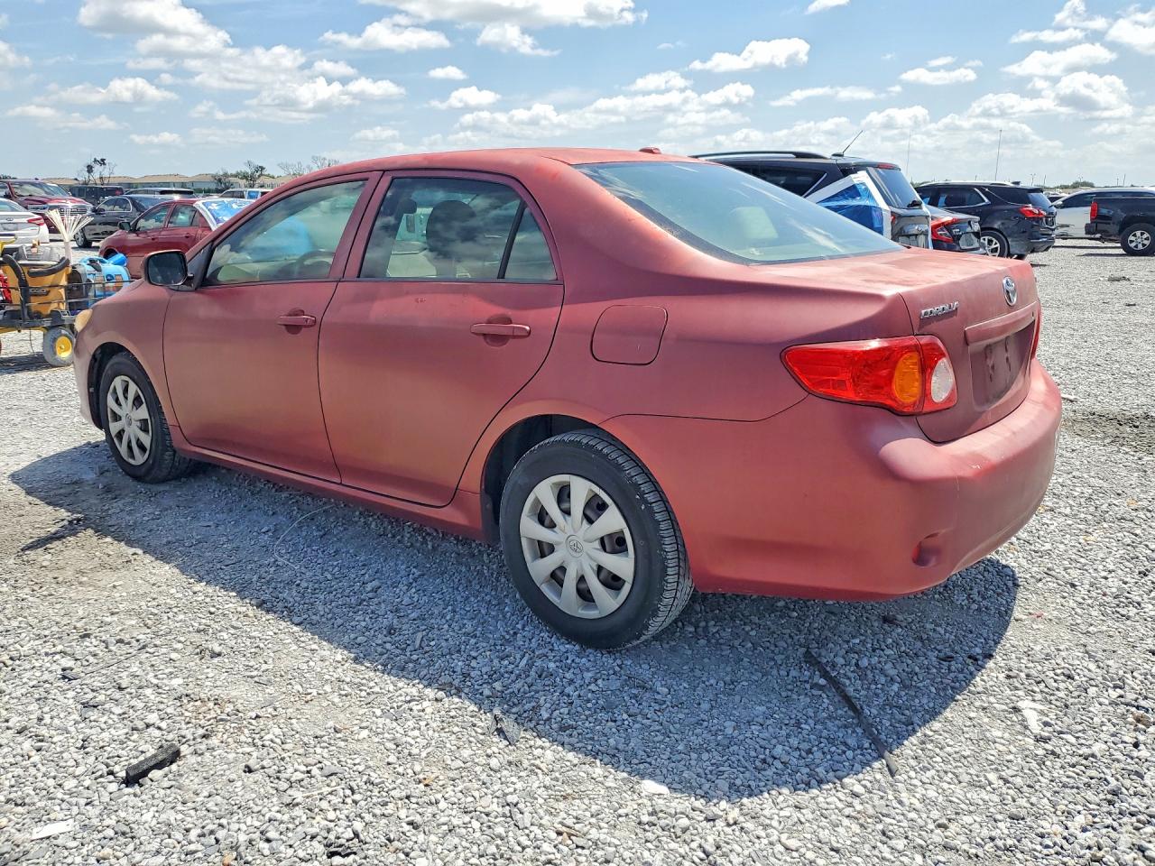 2009 Toyota Corolla Le Red vin: JTDBL40E499034910