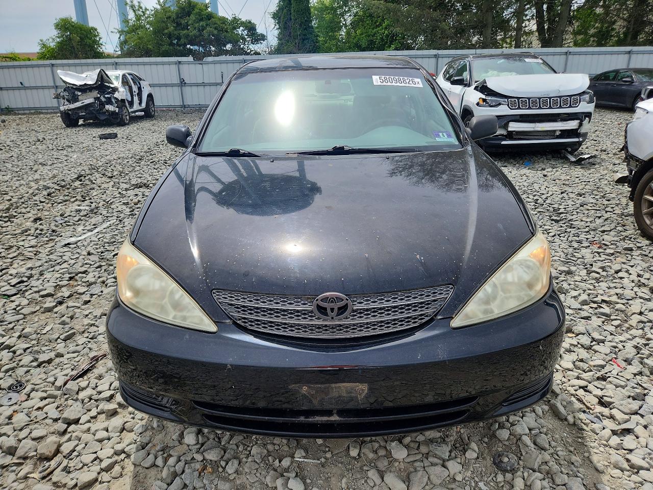 2004 Toyota Camry Le Black vin: JTDBE32K140261377