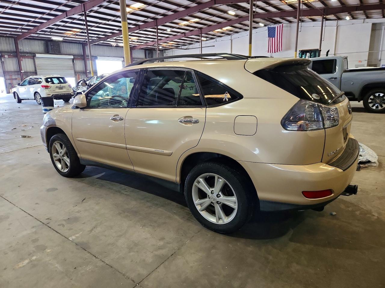 2008 Lexus Rx 400h Gold vin: JTJGW31U682007029