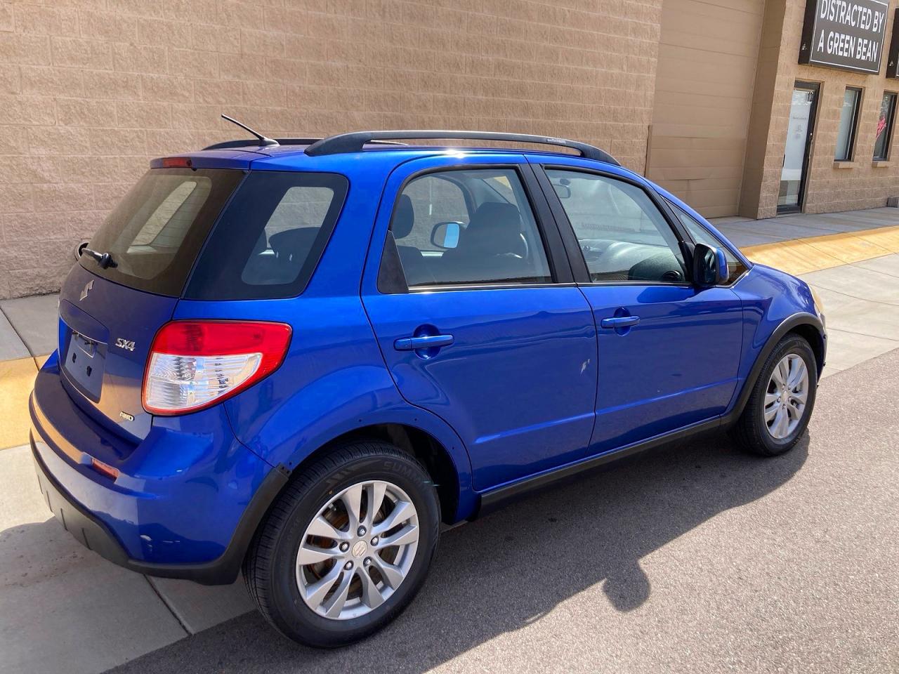 2013 Suzuki Sx4 Blue vin: JS2YB5A31D6101902