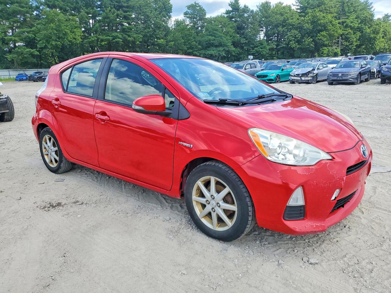 2012 Toyota Prius C Three Red vin: JTDKDTB31C1021590