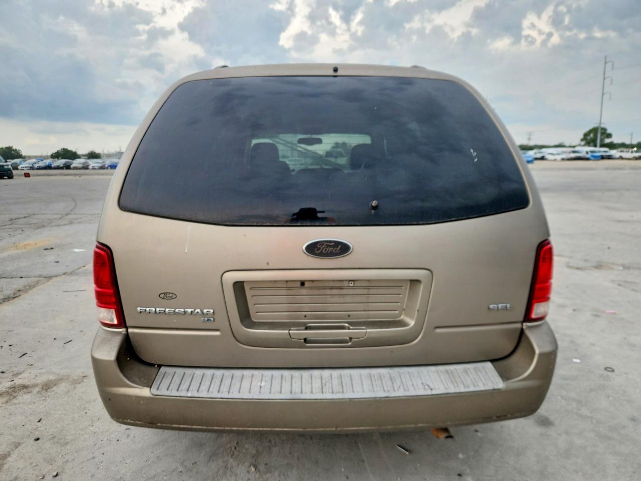 2004 Ford Freestar Sel Золотой vin: 2FMDA52254BA25230