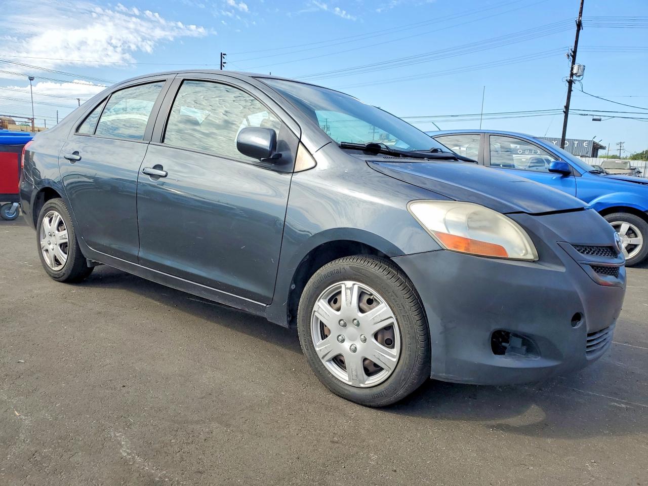 2010 Toyota Yaris Base Угольный vin: JTDBT4K32A4069118