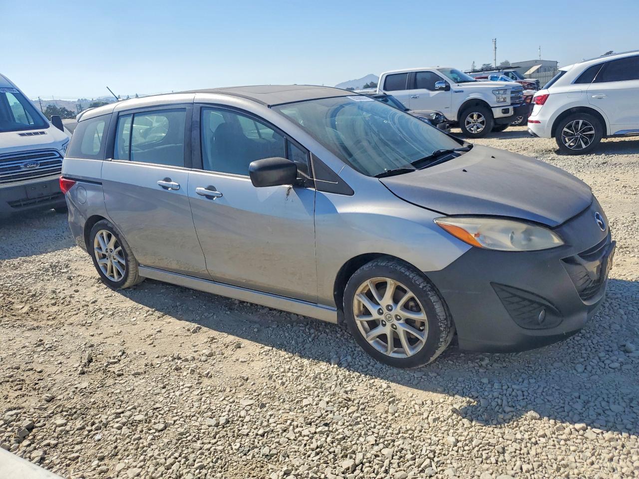 2012 Mazda 5 Silver vin: JM1CW2CL9C0111048