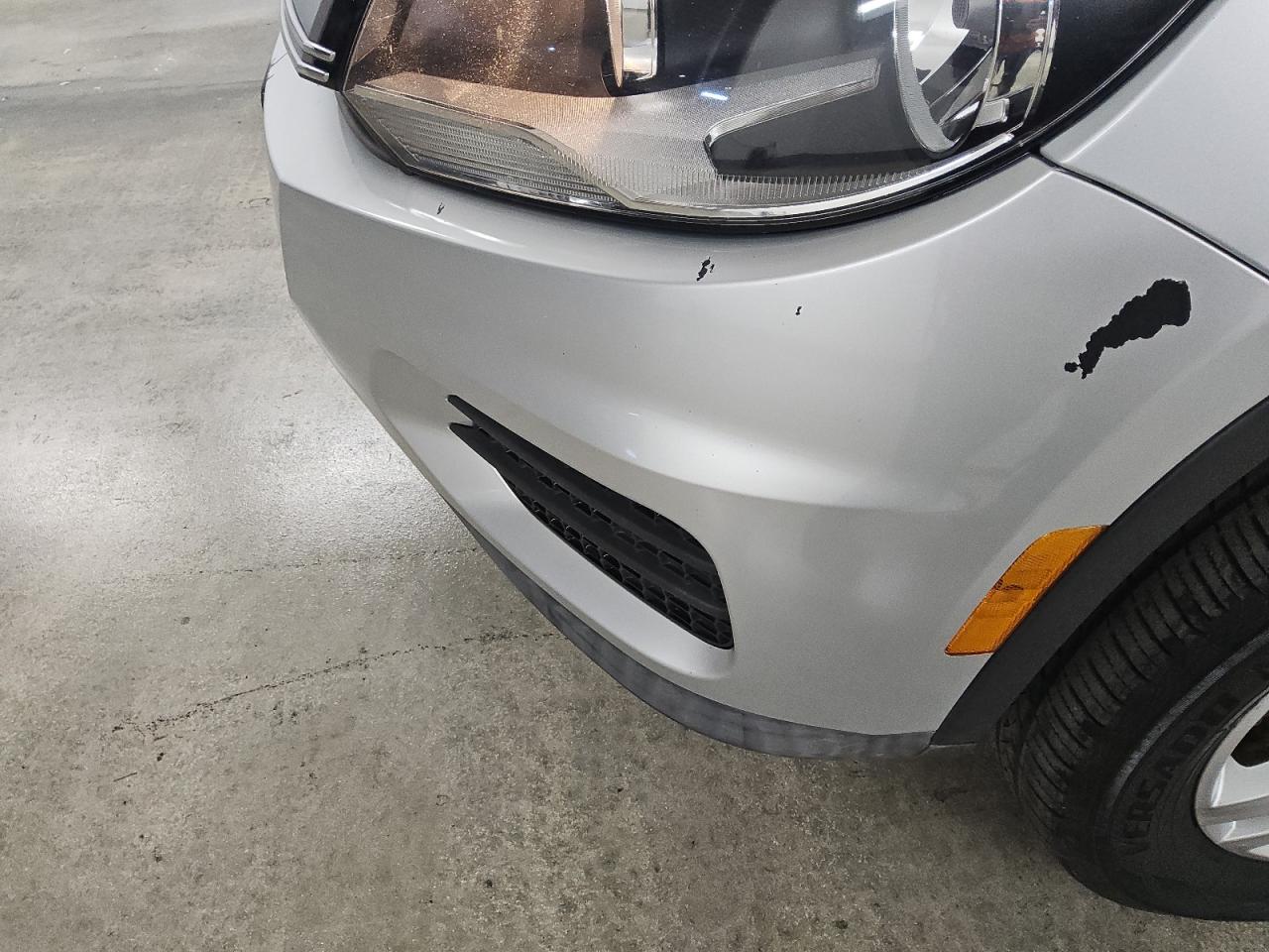 2014 Volkswagen Tiguan S Silver vin: WVGAV3AX9EW603354 Damage: Front Bumper, Peeling, > 12 Inches