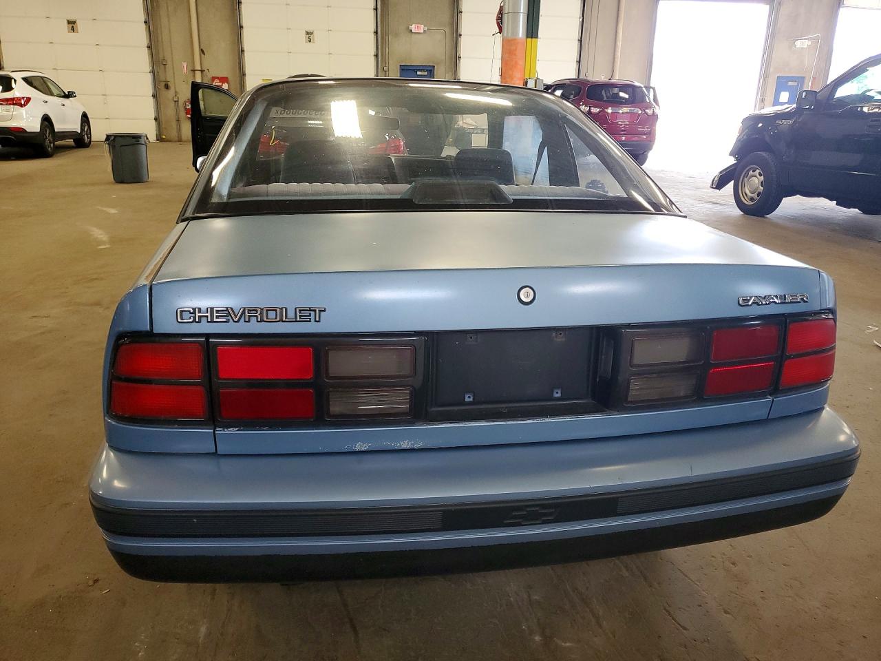 1990 Chevrolet Cavalier Base Blue vin: 1G1JC14G9LJ188632