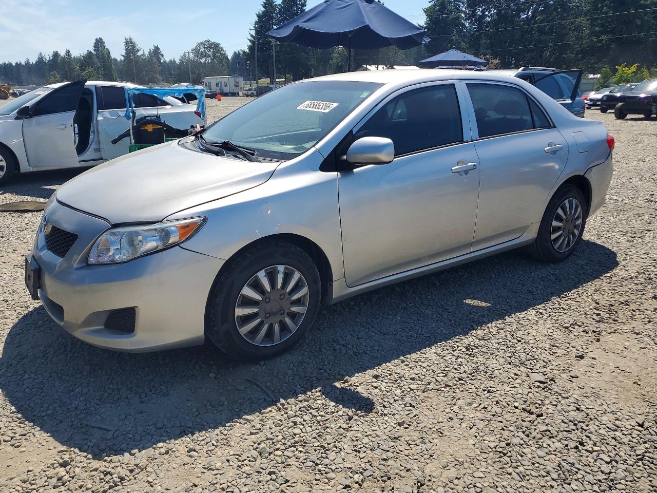 2009 Toyota Corolla Le Silver vin: 1NXBU40E89Z062666