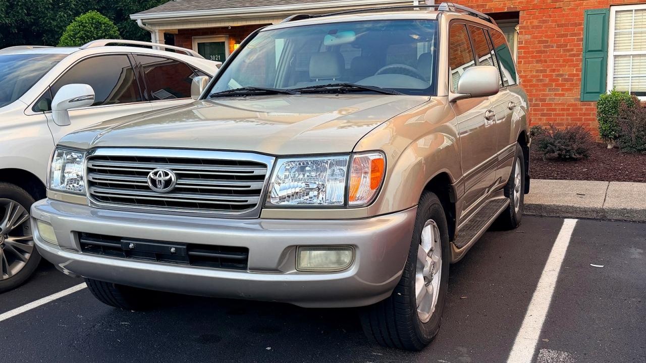 2004 Toyota Land Cruiser Base Gold vin: JTEHT05J742060388