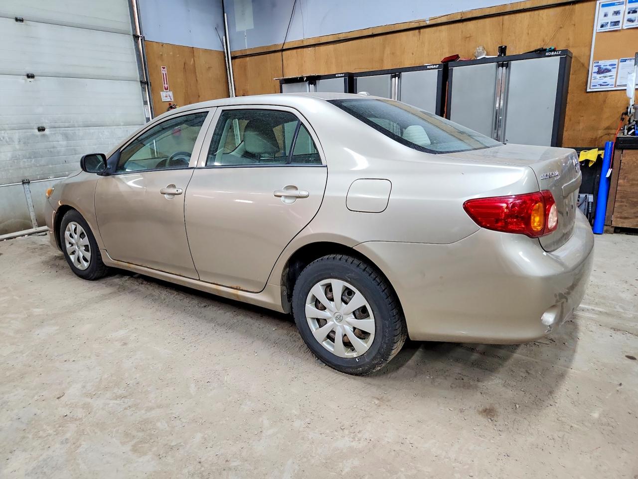2009 Toyota Corolla Base Gold vin: 2T1BU40EX9C006004