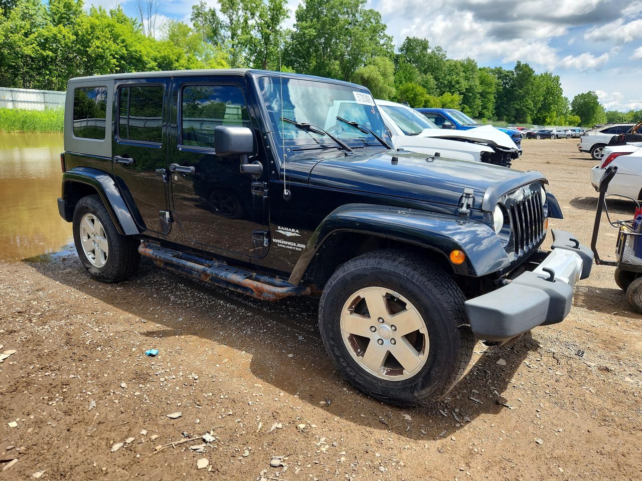 2010 Jeep Wrangler Unlimited Sahara Black vin: 1J4BA5H18AL205639