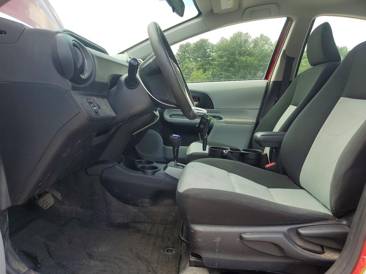 2012 Toyota Prius C Three Red vin: JTDKDTB31C1021590
