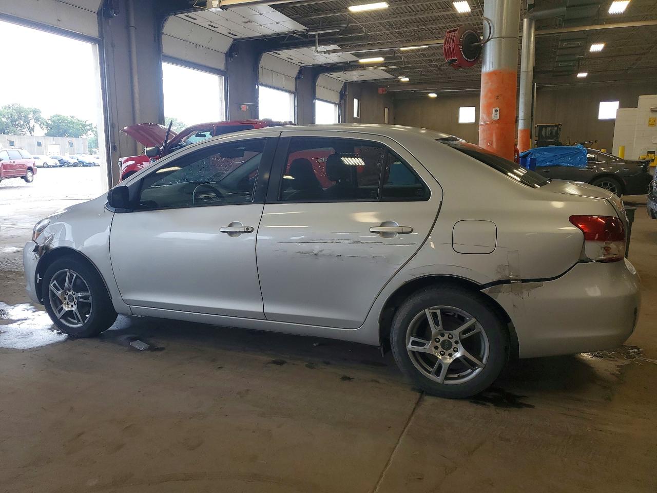 2009 Toyota Yaris Base Gray vin: JTDBT903194052497