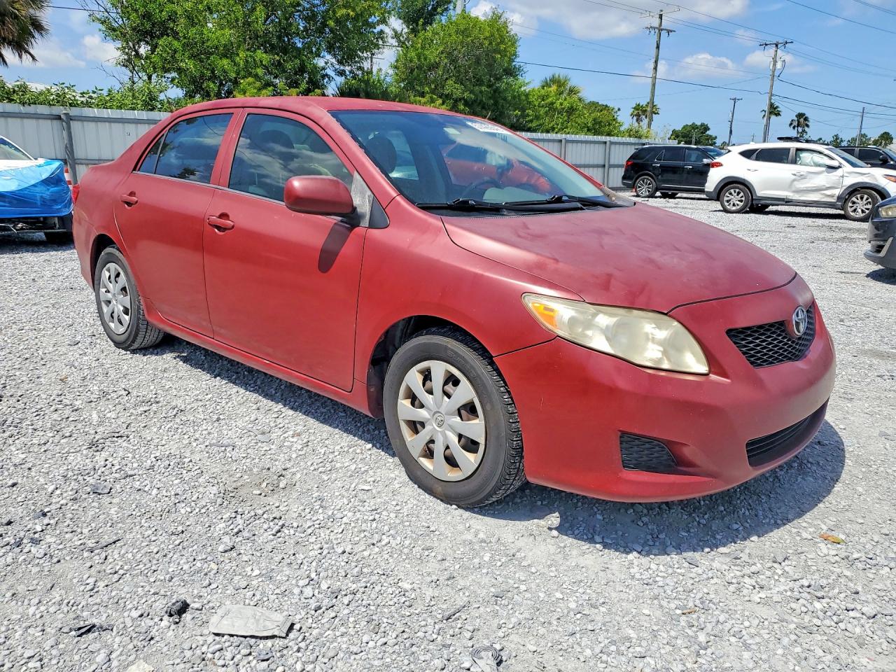 2009 Toyota Corolla Le Red vin: JTDBL40E499034910