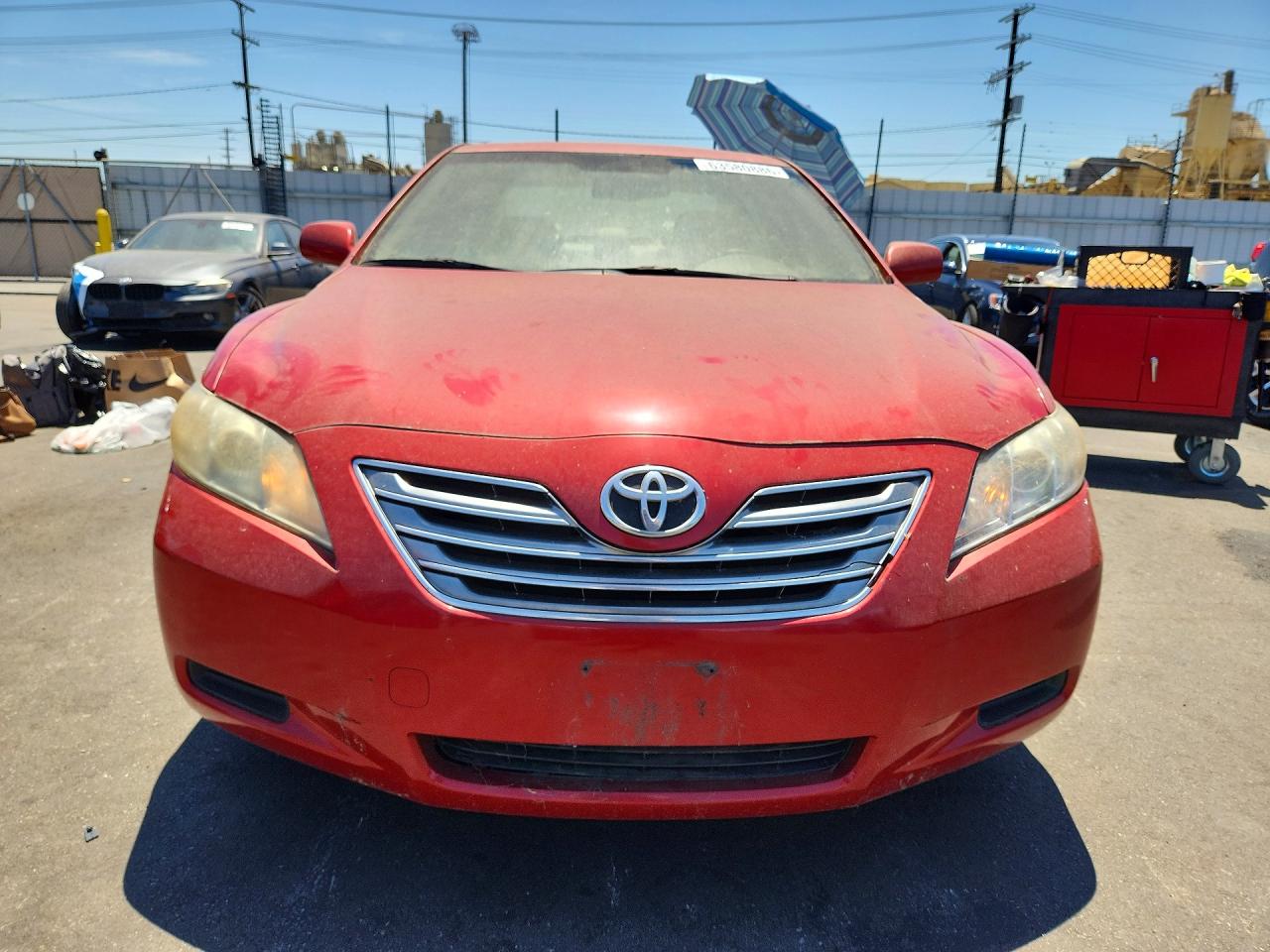 2007 Toyota Camry Hybrid Red vin: JTNBB46K973018486