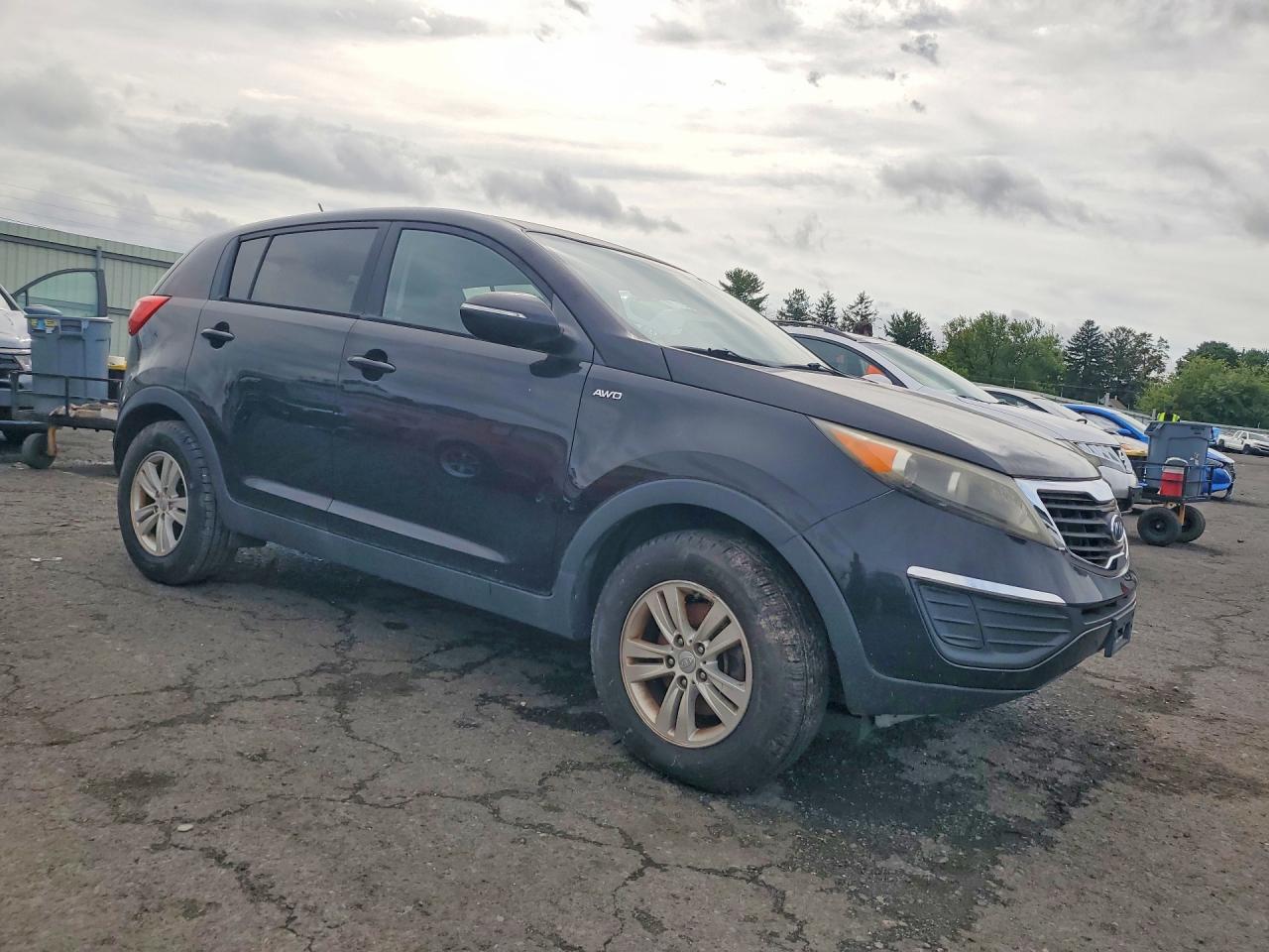 2011 Kia Sportage Lx Черный vin: KNDPBCA29B7095453