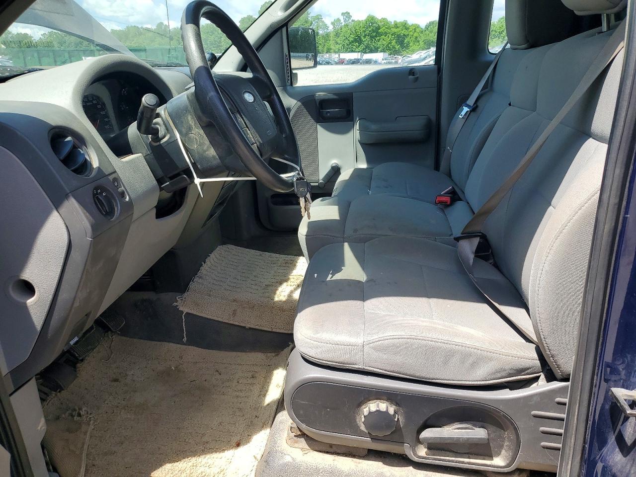 2007 Ford F150 Blue vin: 1FTRF12247NA48222