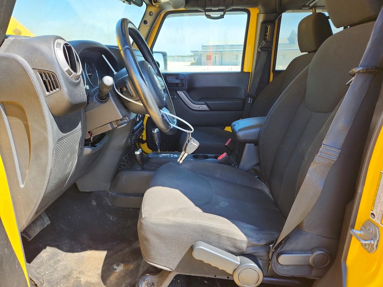 2015 Jeep Wrangler Unlimited Sport Yellow vin: 1C4BJWDGXFL679329
