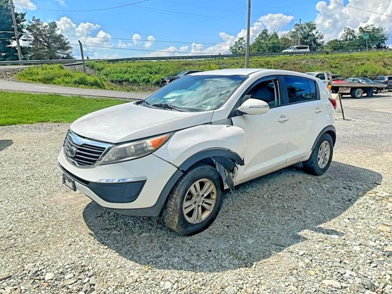 2011 Kia Sportage Lx Yellow vin: KNDPBCA2XB7098121