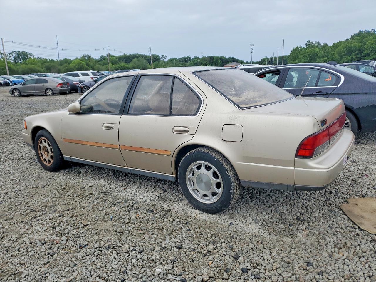 1992 Nissan Maxima Gxe Gold vin: JN1HJ01P7NT605525