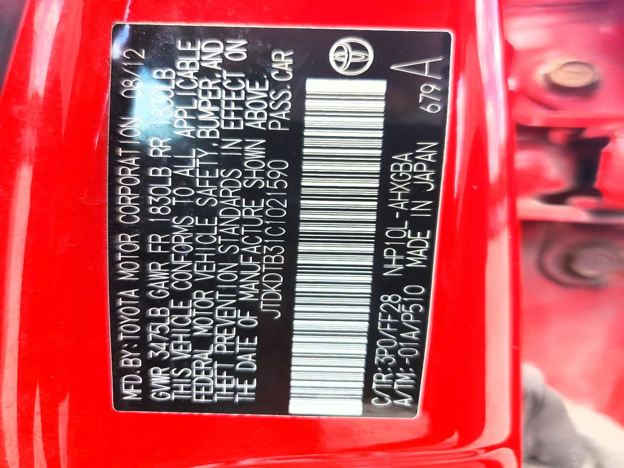 2012 Toyota Prius C Three Red vin: JTDKDTB31C1021590