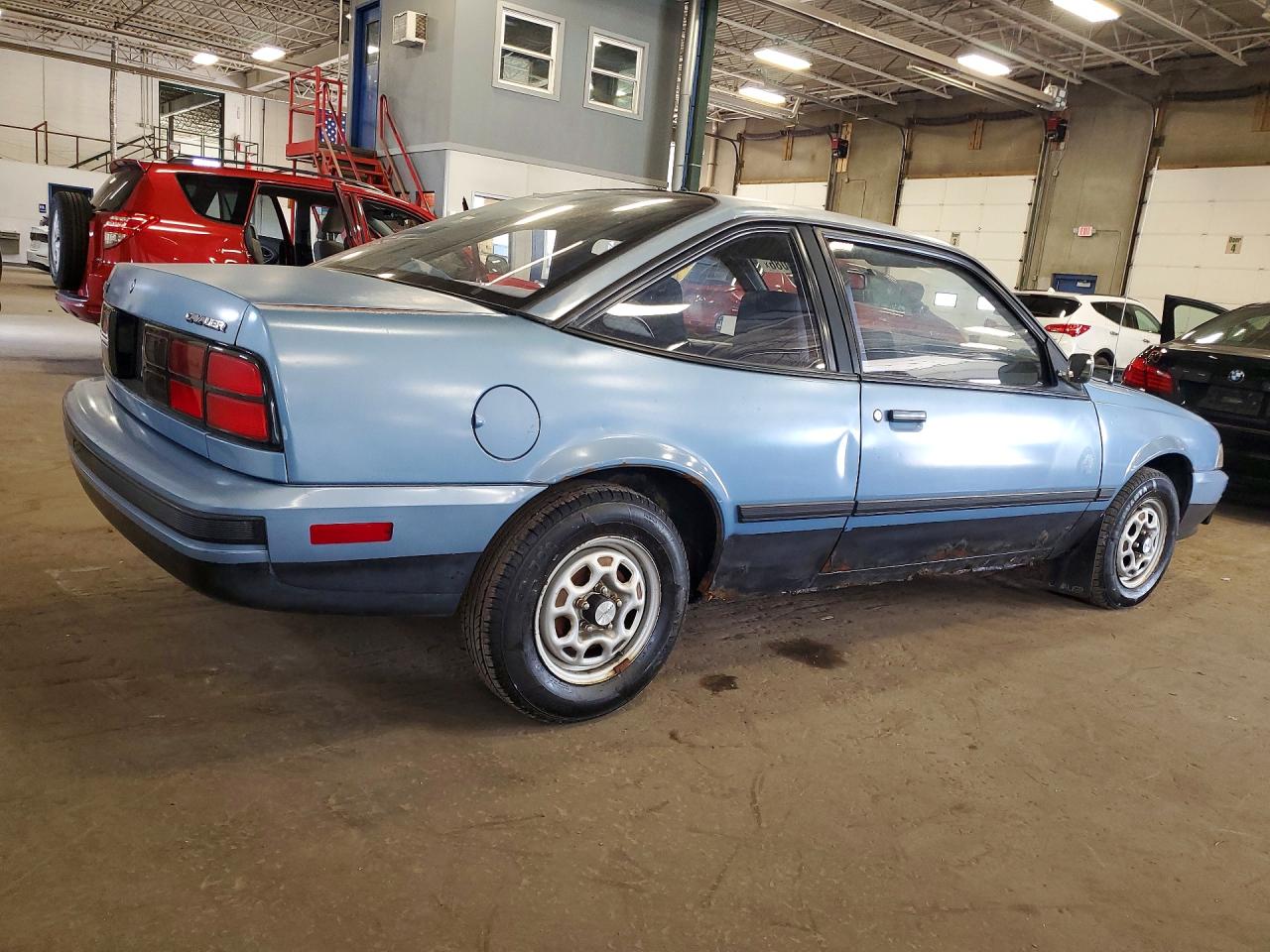 1990 Chevrolet Cavalier Base Blue vin: 1G1JC14G9LJ188632