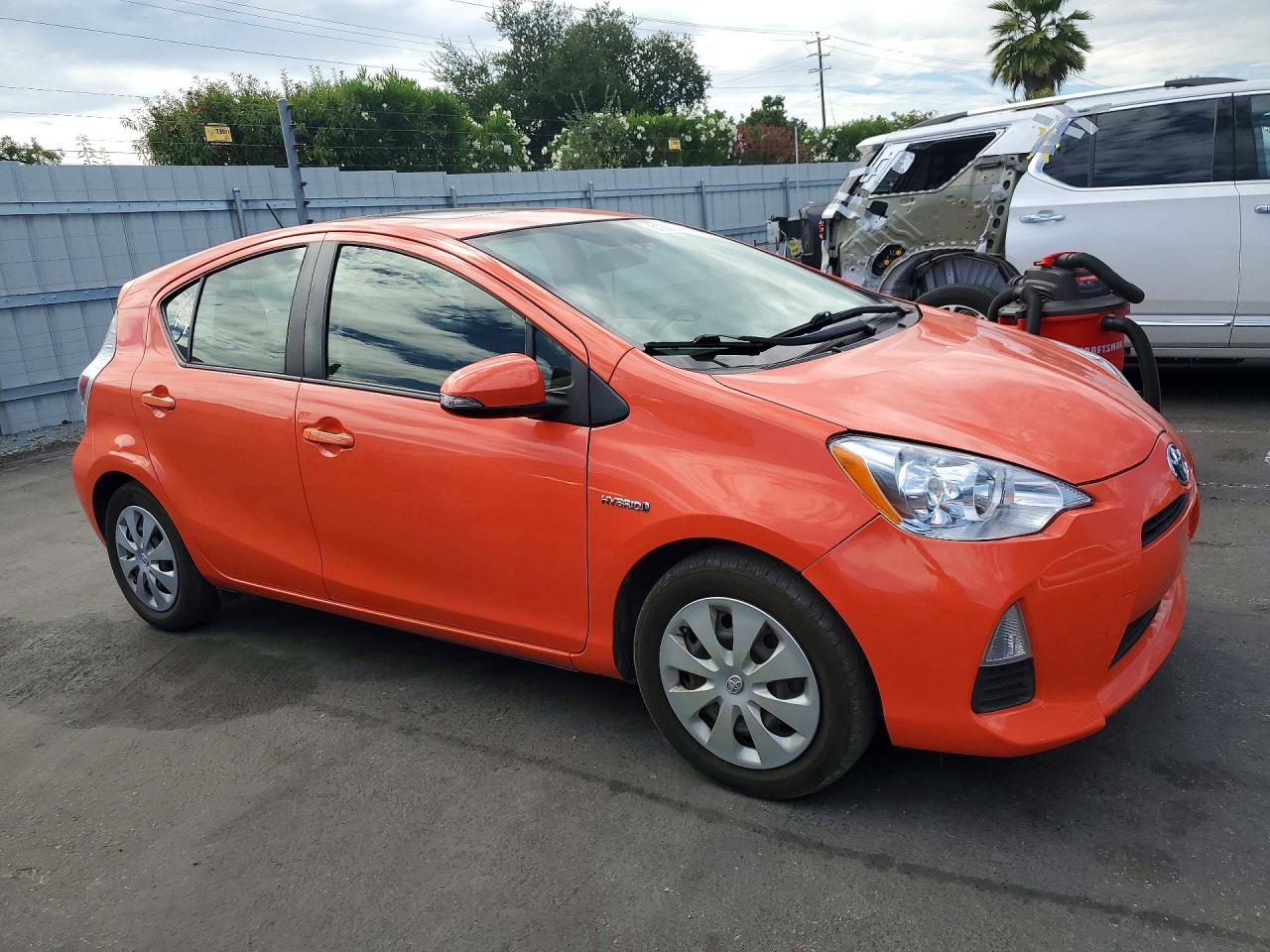 2013 Toyota Prius C Three Orange vin: JTDKDTB36D1038340