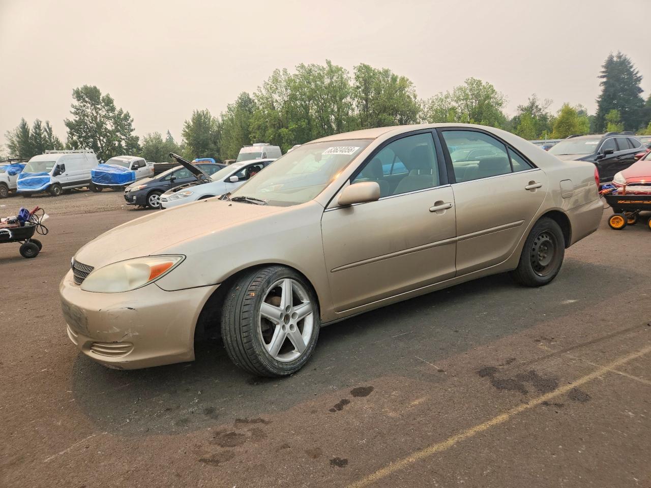 2004 Toyota Camry Le Gold vin: 4T1BE32K74U359169