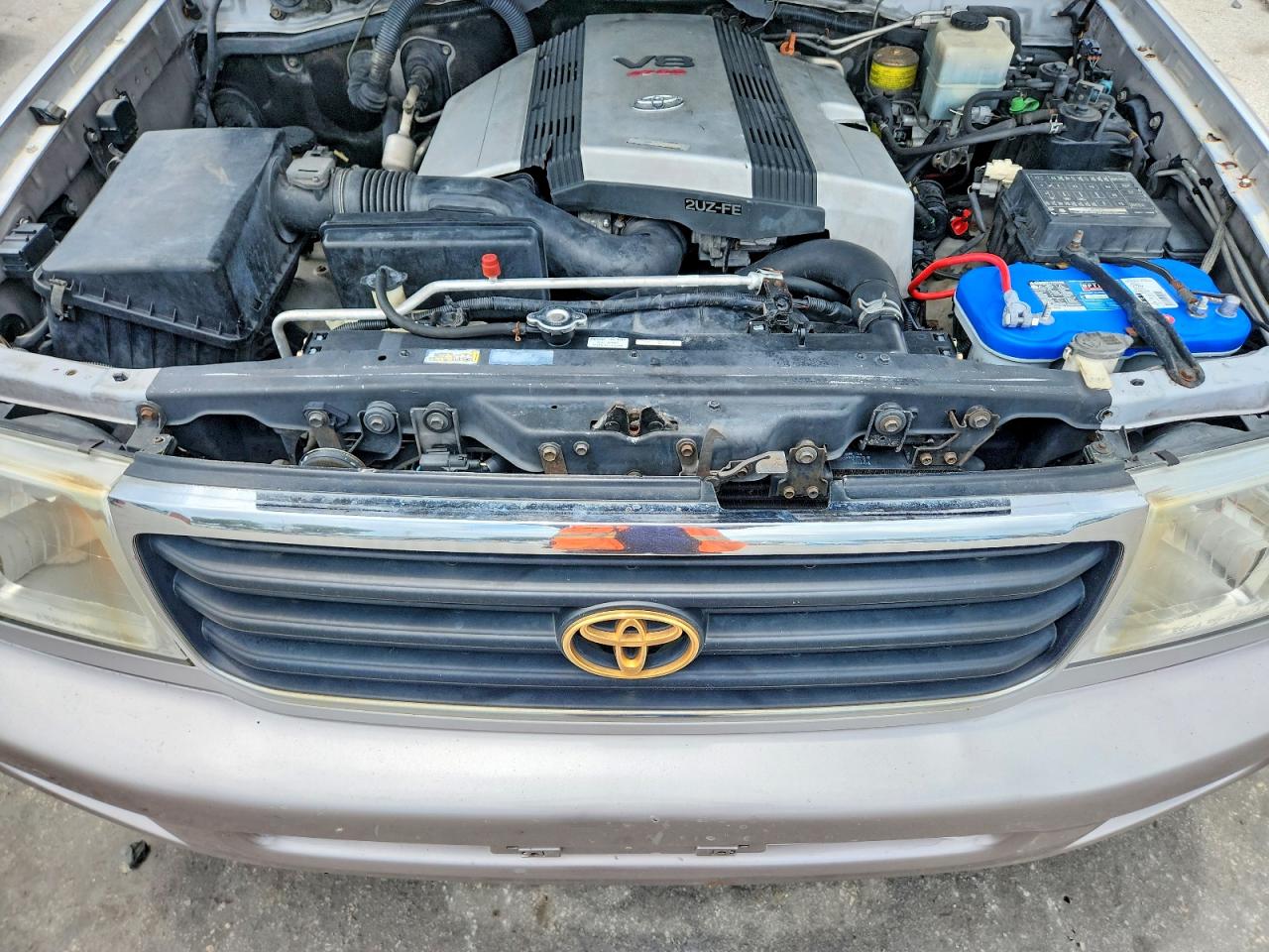 1999 Toyota Land Cruiser Base Gold vin: JT3HT05J5X0027141