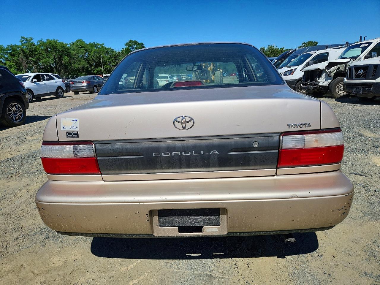 1997 Toyota Corolla Base Gold vin: 2T1BA02EXVC176906