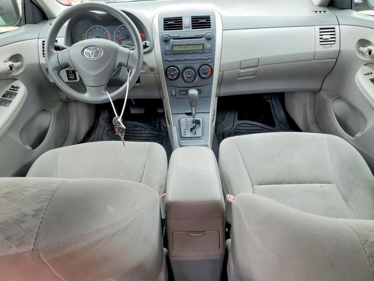 2009 Toyota Corolla Le Red vin: 2T1BU40E19C105715