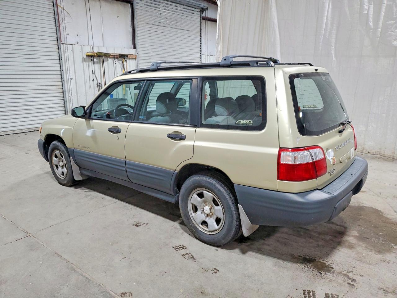 2002 Subaru Forester L Tan vin: JF1SF63502H710852