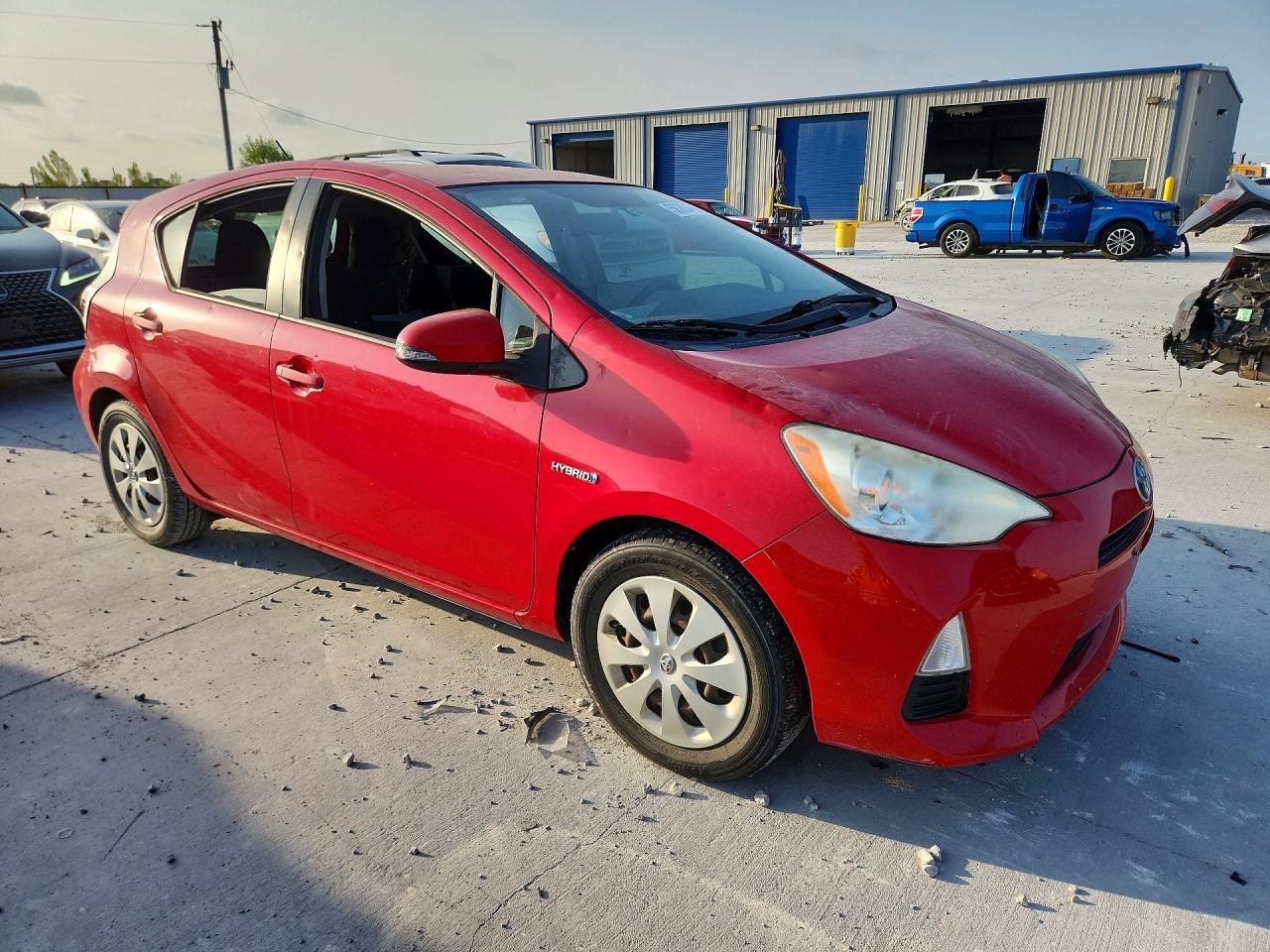 2012 Toyota Prius C Two Red vin: JTDKDTB31C1503220