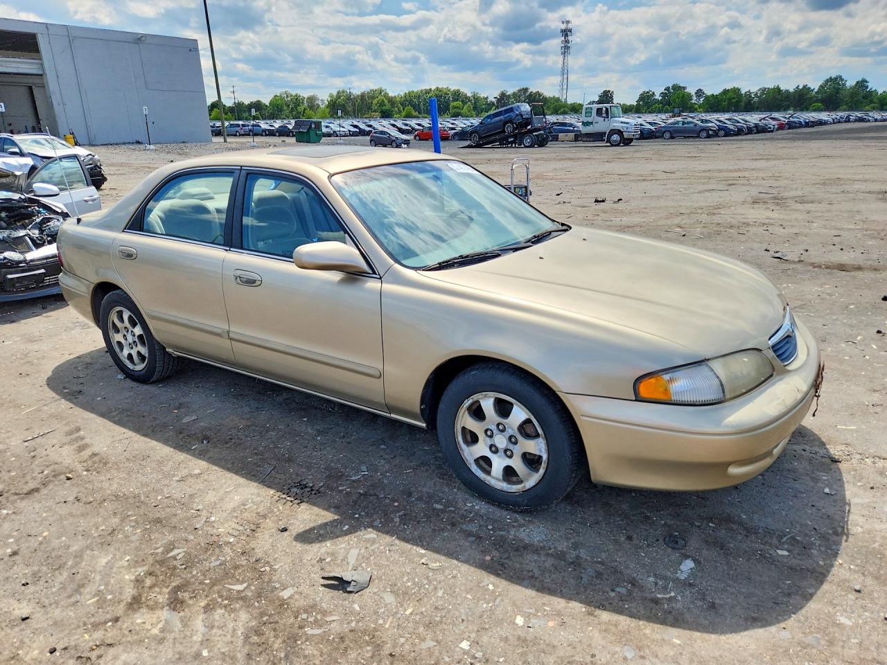 1999 Mazda 626 Es Tan vin: 1YVGF22D7X5871641