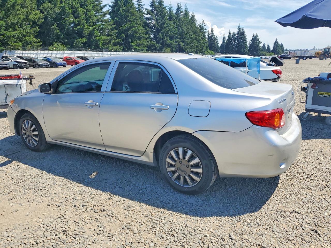 2009 Toyota Corolla Le Silver vin: 1NXBU40E89Z062666