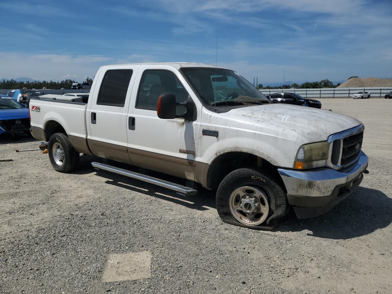 2004 Ford F250 Super Duty White vin: 1FTNW21P84EC11306 Damage: Right Front Tire, Flat, Repair Required