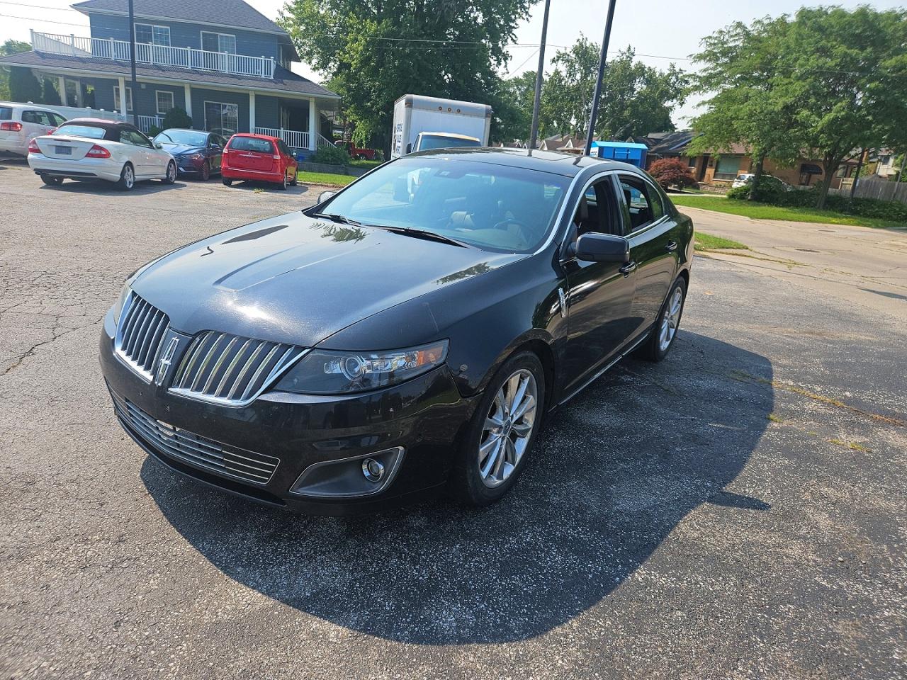 2012 Lincoln Mks Black vin: 1LNHL9FT8CG806403