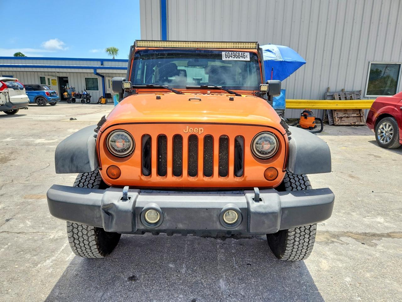 2011 Jeep Wrangler Sport Orange vin: 1J4AA2D16BL574551