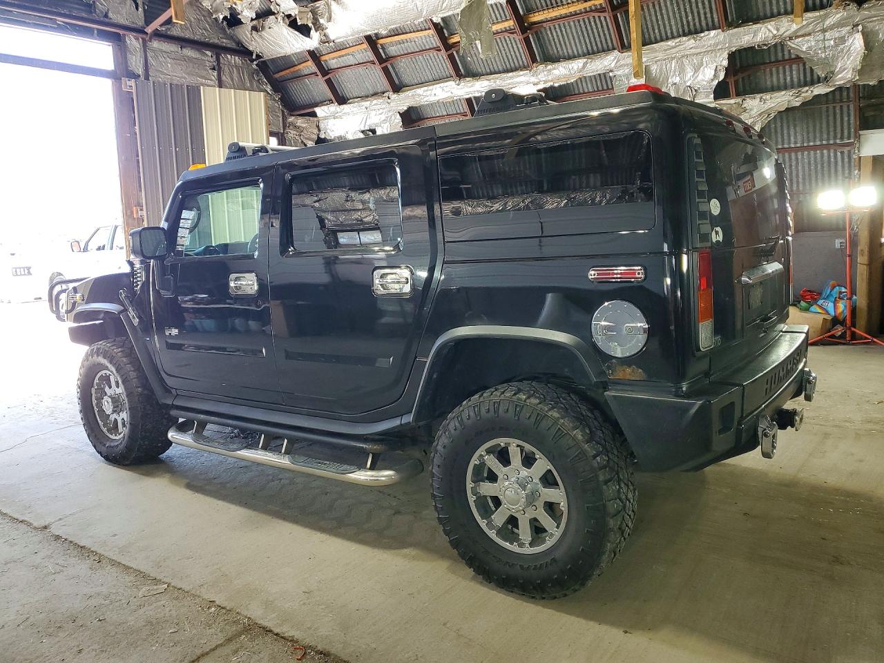 2004 Hummer H2 Black vin: 5GRGN23U74H107367