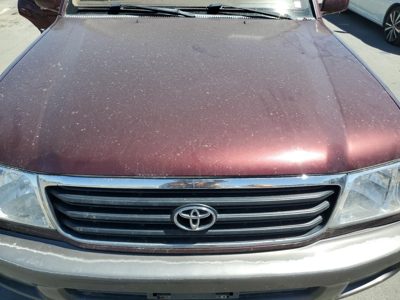 1999 Toyota Land Cruiser    Burgundy vin: JT3HT05JXX0048695