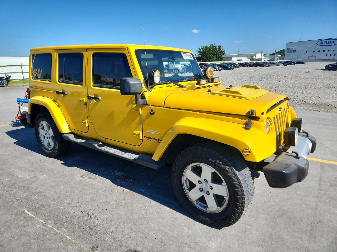 2011 Jeep Wrangler Unlimited Sahara Yellow vin: 1J4HA5H12BL530282