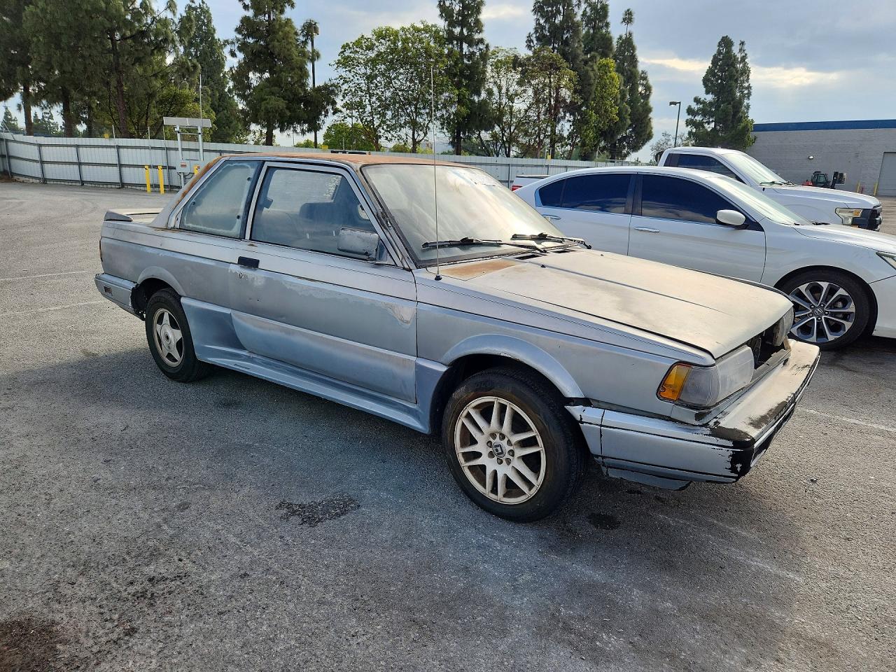 1990 Nissan Sentra Base Blue vin: 1N4GB22B8LC790496