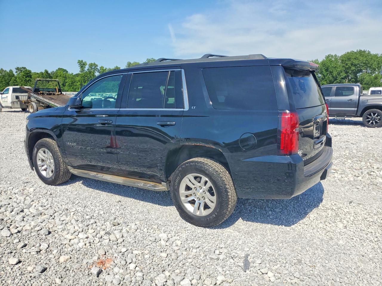 2015 Chevrolet Tahoe K1500 Lt Черный vin: 1GNSKBKC5FR195174