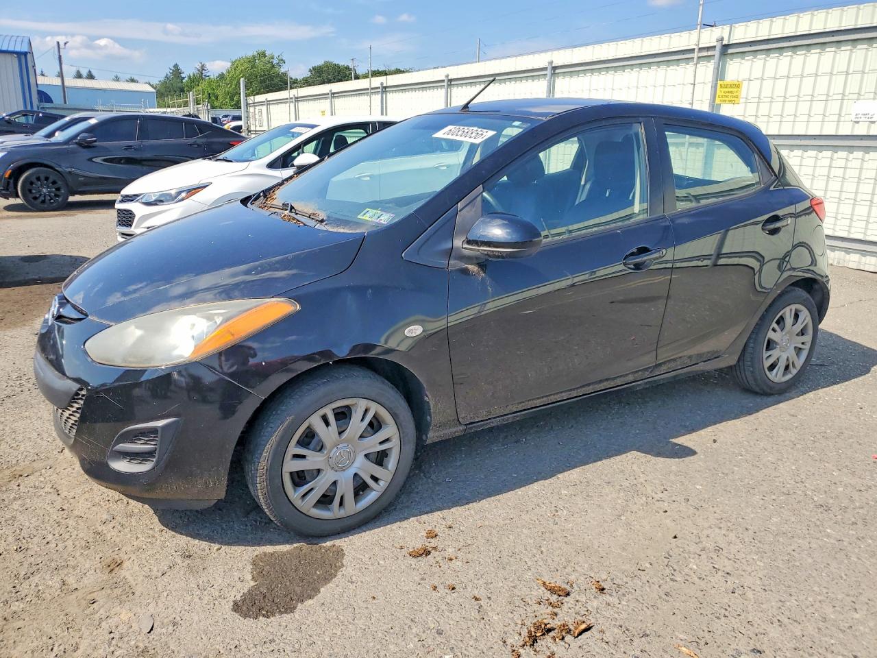 2011 Mazda Mazda2 Black vin: JM1DE1HYXB0124198