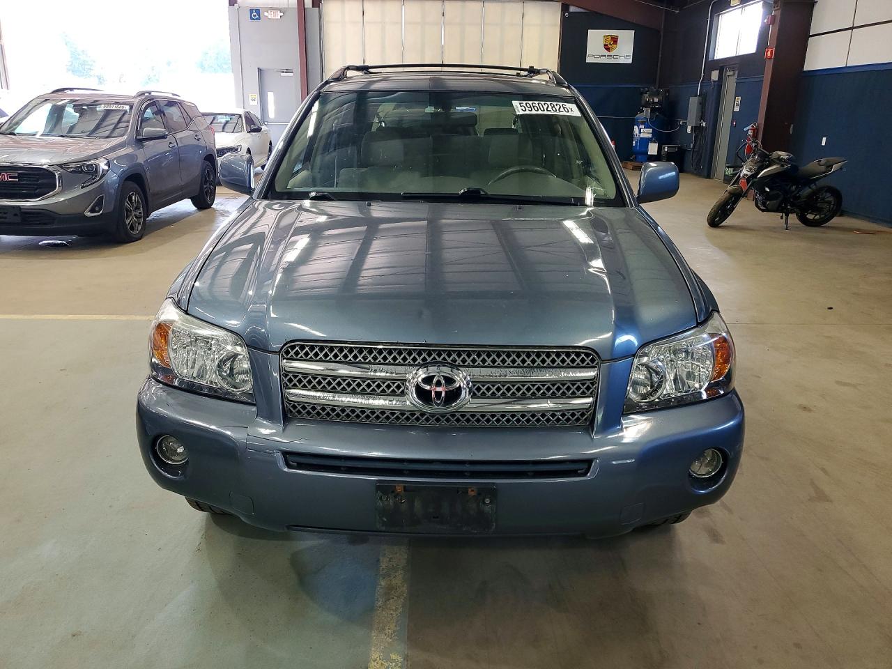 2006 Toyota Highlander Hybrid Blue vin: JTEEW21A960023532