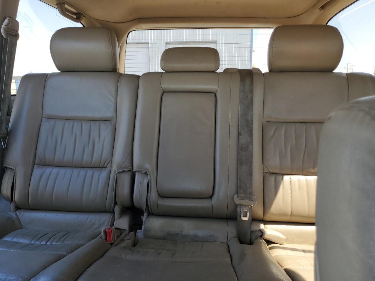 1999 Toyota Land Cruiser    Burgundy vin: JT3HT05JXX0048695