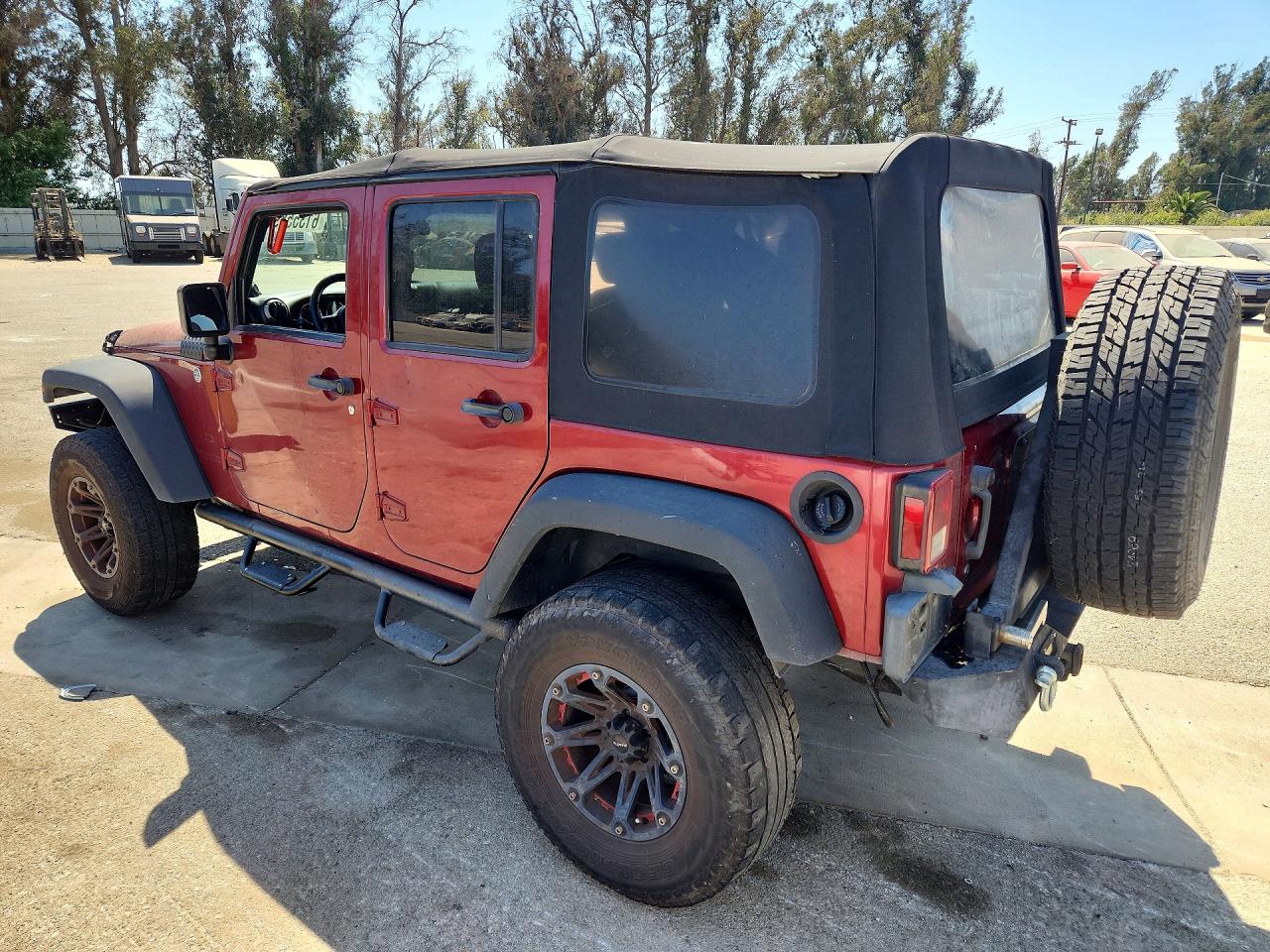 2012 Jeep Wrangler Unlimited Sport Burgundy vin: 1C4BJWDGXCL201195