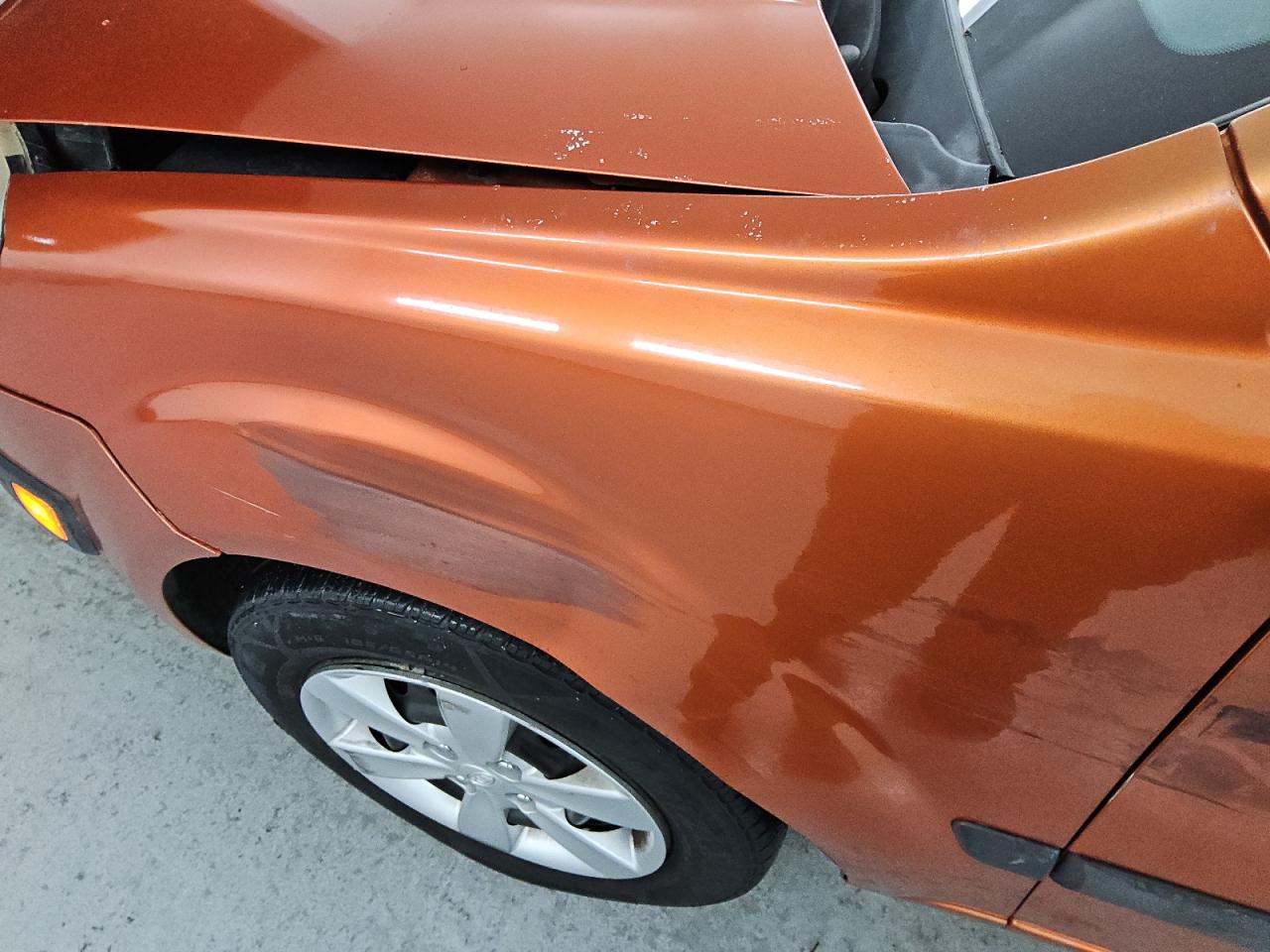 2009 Kia Rio5 Lx Orange vin: KNADE243896567101 Damage: Left Front Fender, Dent(S) W/ Paint Dmg, 5 To 6 Inches