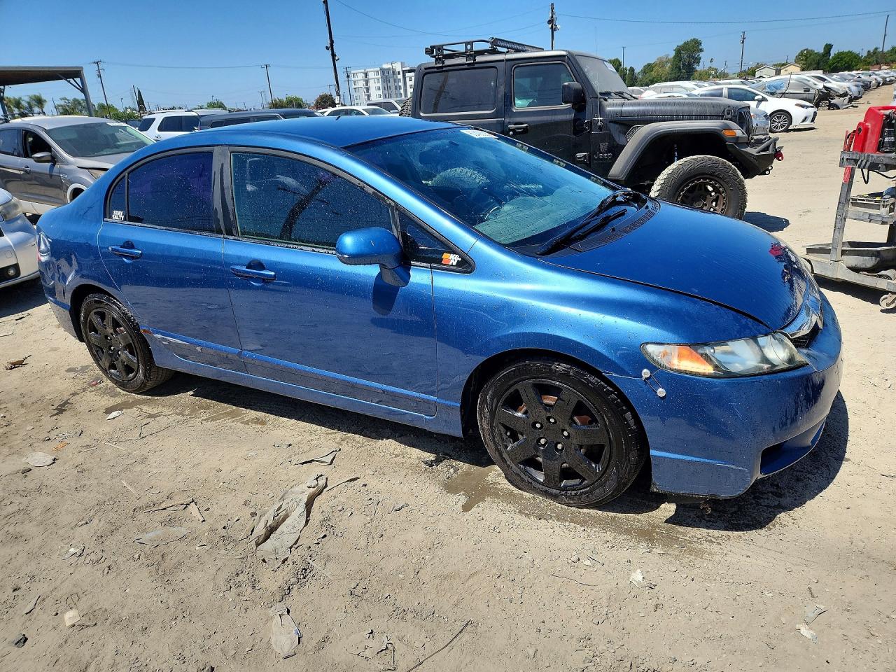 2010 Honda Civic Lx Blue vin: 19XFA1F59AE057399