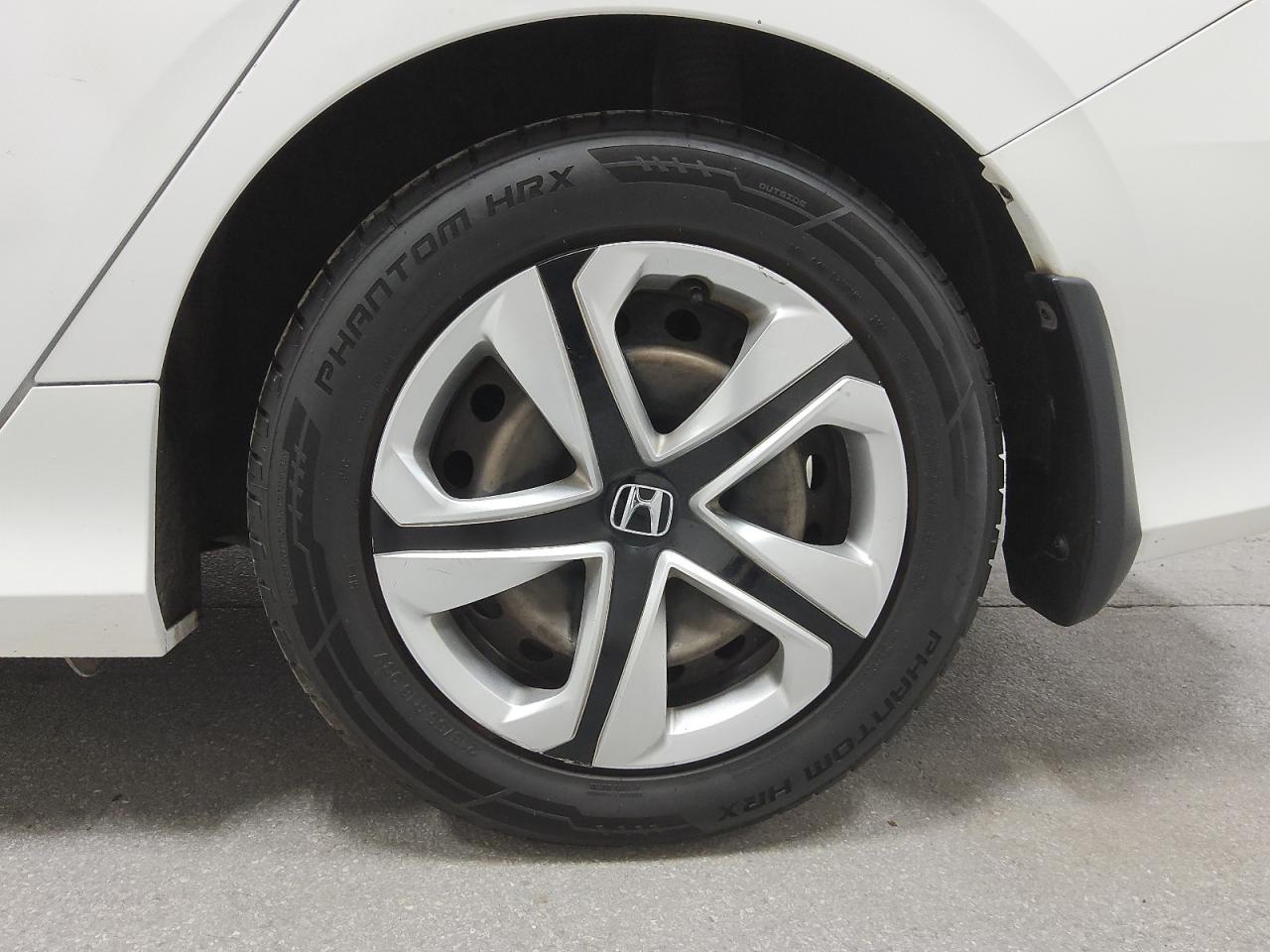 2016 Honda Civic Lx Белый vin: 19XFC2F51GE055574 Damage: Left Rear Wheel Cover, Curb Rash, 2 To 3 Inches