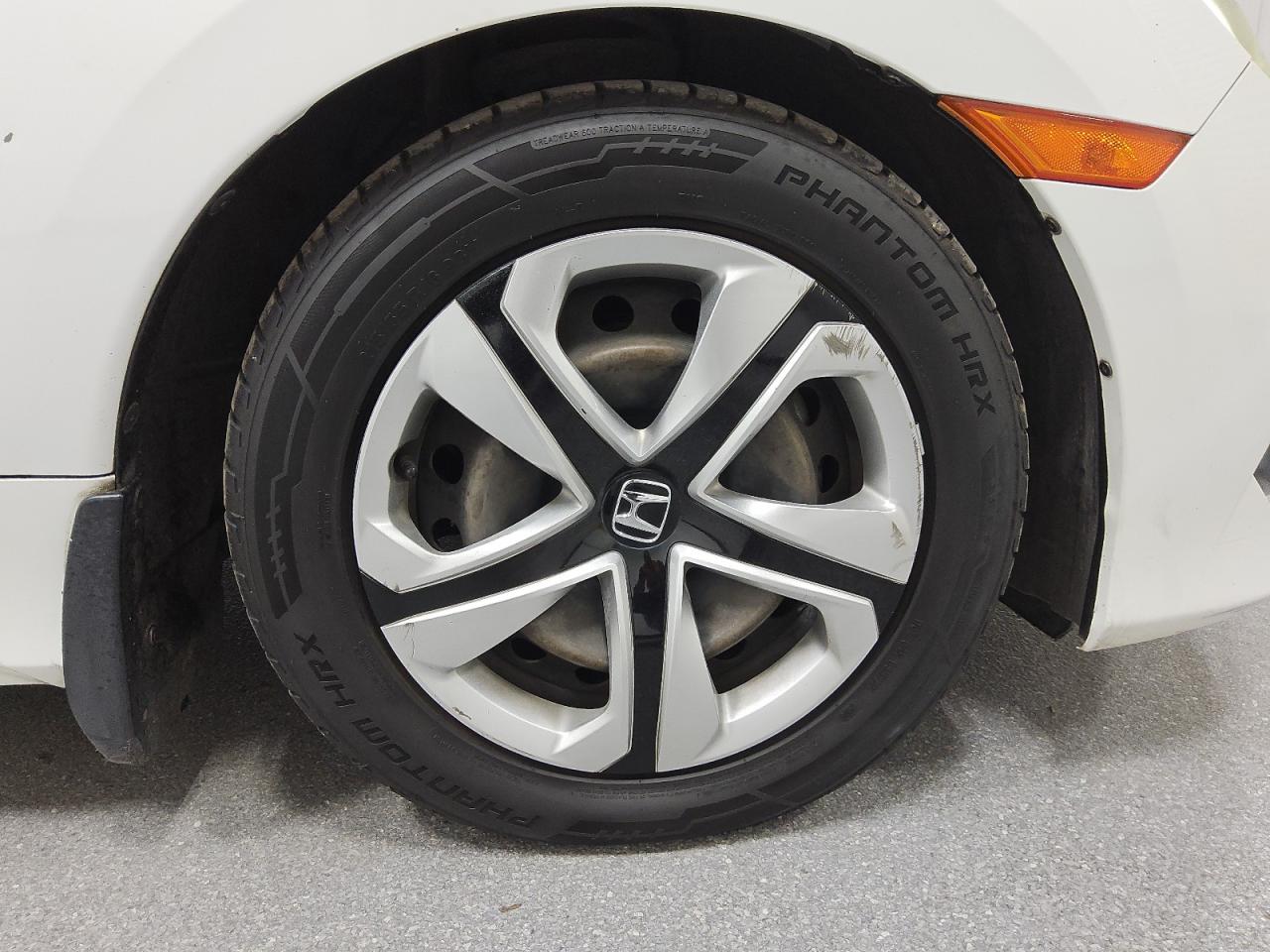 2016 Honda Civic Lx Белый vin: 19XFC2F51GE055574 Damage: Right Front Wheel Cover, Curb Rash, 4 To 5 Inches